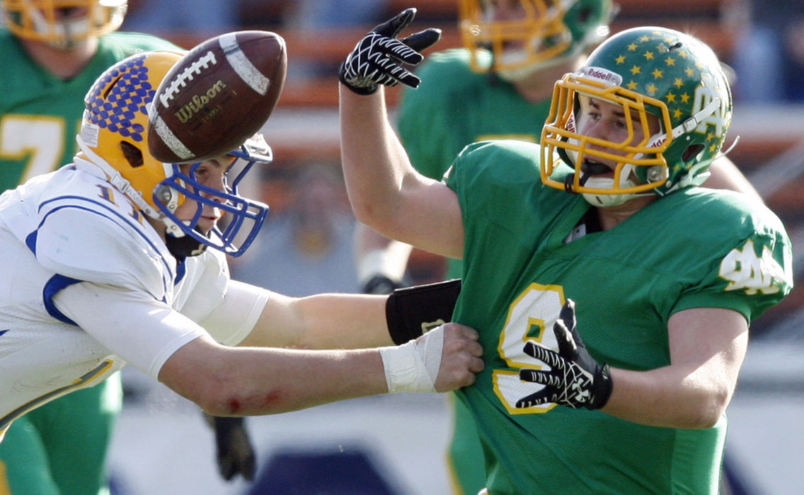 Story - 2nd placeNewark Catholics Ryan Fitzgerald (9) can't come up with the catch against Marion Locals Adam Bertke (11) during the fourth  quarter of their Division VI state championship game at Paul Brown Tiger Stadium in Massillon. (Kyle Robertson / The Columbus Dispatch)