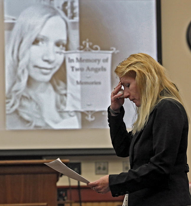 General News - 3rd placeLori Ballman, mother of Deanna Ballman, reads her victim impact state during Ali Salim sentencing in Delaware Country Common Pleas Court. Salim pleaded guilty in October to killing 23-year-old Deanna Ballman and her unborn daughter in the summer of 2012.  (Kyle Robertson / The Columbus Dispatch)