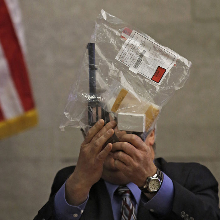 General News - HM - Mark Hardy a Columbus police ballistics expert talks about the revolver used in a aggravated murder trial in Franklin County Common Pleas Court. (Tom Dodge / The Columbus Dispatch )