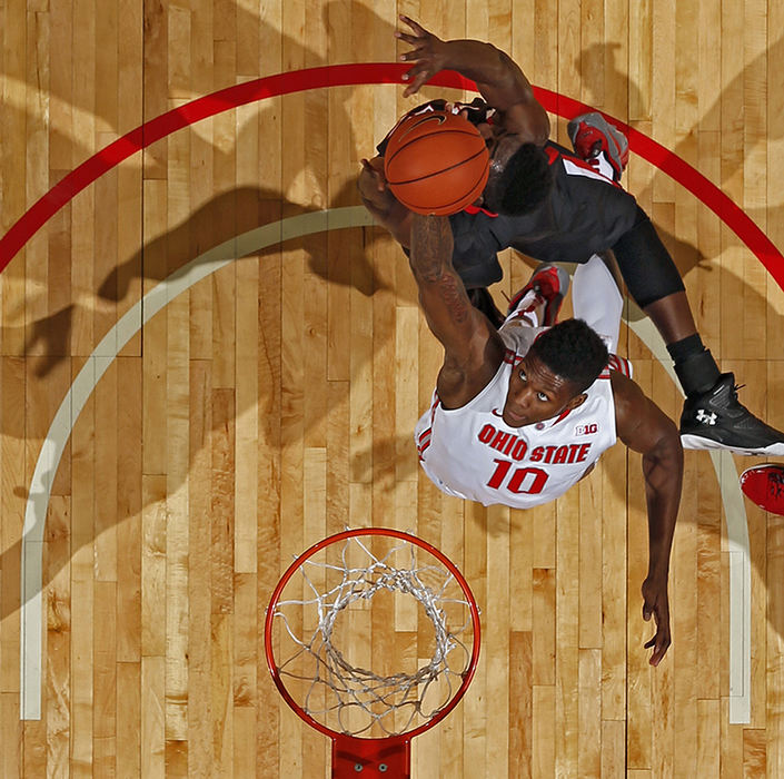 sSports - HM - Ohio State center David Bell (10) grabs a rebound against Virginia Military Keydets forward Trey Chapman (15) during the 2nd half of their game at Value City Arena in Columbus. (Kyle Robertson / The Columbus Dispatch)