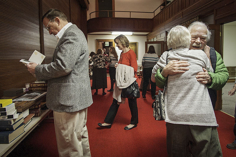 Story - 2nd place - Parishioners say goodbye after the last service at the Church before the New Year. (Mitchell Pe Masilun / The (Mansfield) News Journal)