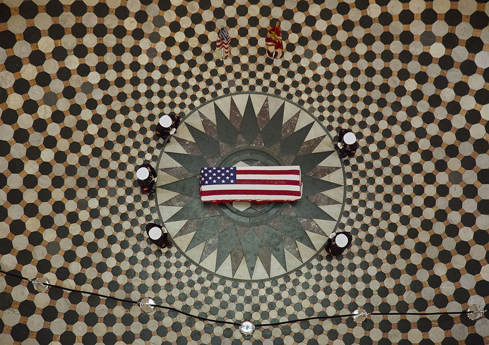 AGeneral News - 1st place - Marines from Arlington, Virginia stand guard around the casket of astronaut and senator John Glenn as his body lies in honor in the rotunda of the Ohio Statehouse in Columbus on Dec. 16, 2016. Glenn died on Dec. 8 at the age of 95.  (Adam Cairns / The Columbus Dispatch)