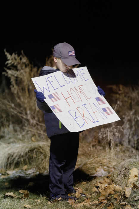 MTGeneral News - 3rd place - Casen Simcox, 9, holds a sign welcoming home Army Spc. Brian Carroll as he waits for Carroll's police escort home at the Sycamore Creek neighborhood in Pickerington. Carroll is a member of an engineering unit that returned home from Kuwait in August 2016, but he was diagnosed with brain cancer before returning home and recently completed chemotherapy at a hospital in San Antonio, Texas. (Joshua A. Bickel / The Columbus Dispatch)