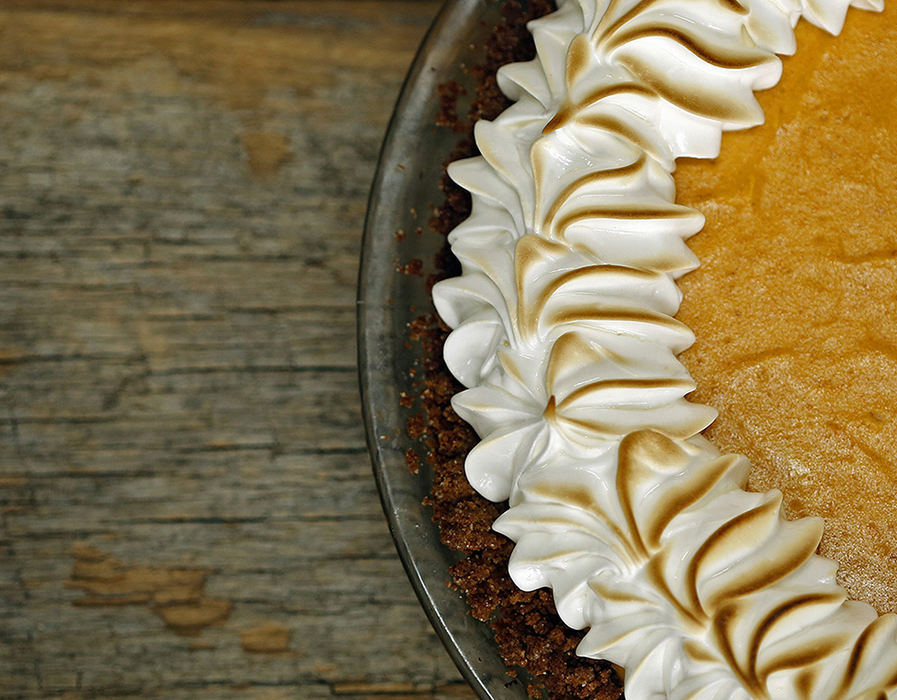  - Pumpkin cheesecake pie with gingersnap crust and meringue crown. (Kyle Robertson / )