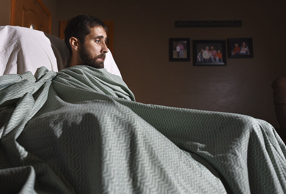 Portrait - 3rd place - Adam Tysinger was injured while building a pole barn in early December. He was crushed under more than 1200 pounds of material, suffering multiple injuries. (Chris Crook / Zanesville Times Reocorder)