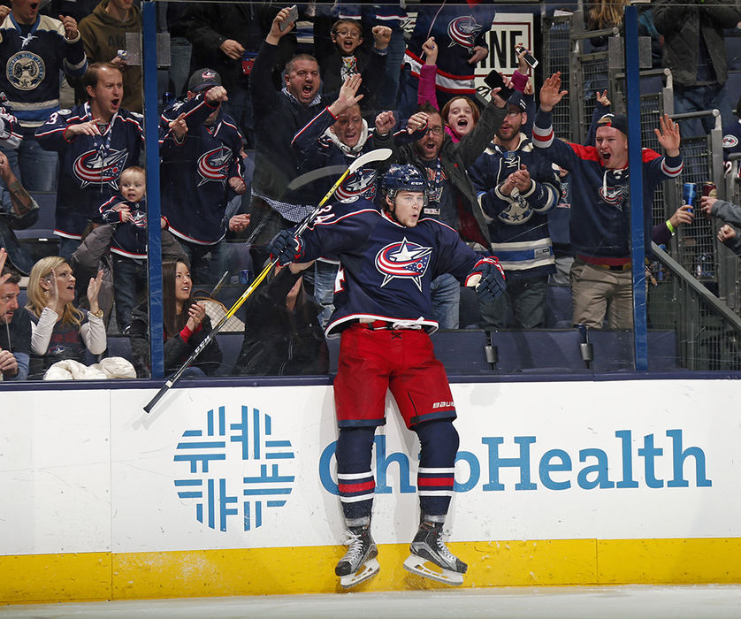 Sports Feature - 2nd place - Columbus Blue Jackets right wing Josh Anderson (34) scores the go a head goal against New York Islanders in the 3rd period of their game at Nationwide Arena in Columbus. The goal made it 3-2.  (Kyle Robertson / The Columbus Dispatch)