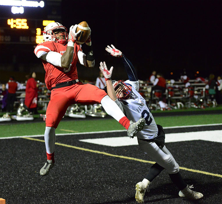 Sports - 2nd place - Darius Daniels III scores Port Clinton's only touchdown of the game against Bishop Hartley in a regional semifinal. (Molly Corfman / The News-Messenger)