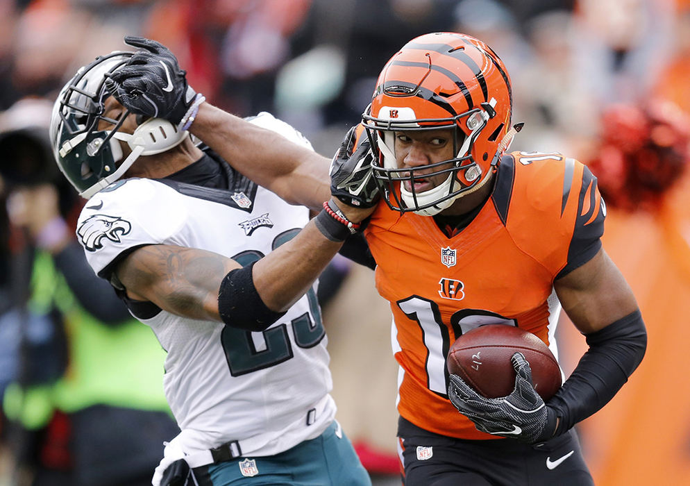 SSports - HM - Cincinnati Bengals wide receiver Cody Core (16) stiff arms Philadelphia Eagles free safety Rodney McLeod (23) as he runs with his first career catch in the first quarter at Paul Brown Stadium in Cincinnati. (Sam Greene / Cincinnati Enquirer)