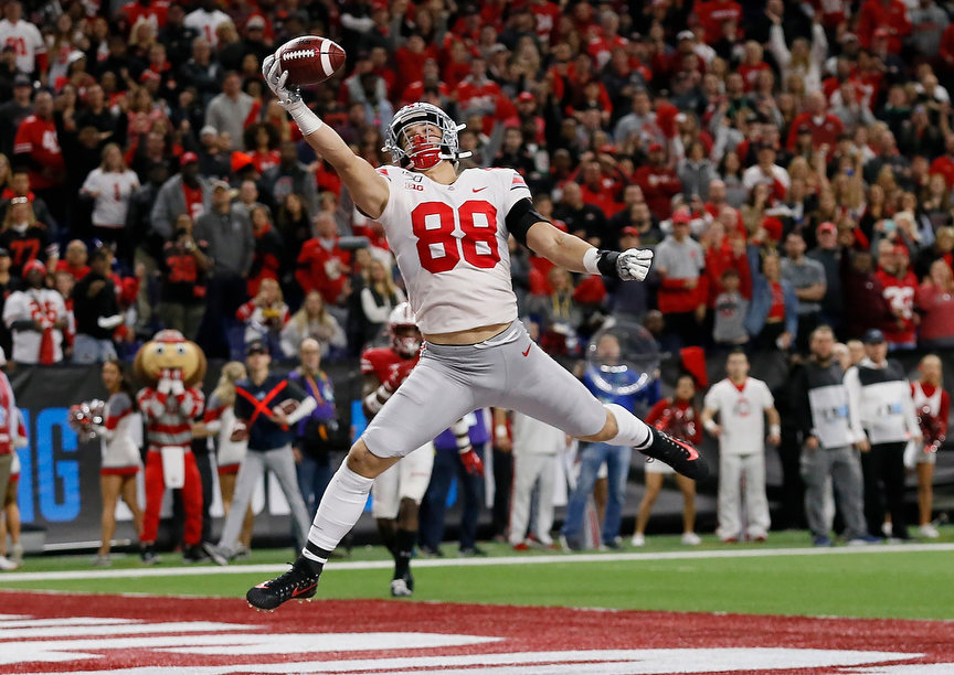 Sports - 2nd place - Ohio State tight end Jeremy Ruckert (88) catches a 16-yard touchdown pass during the third quarter of the Big Ten Championship Game against the Wisconsin Badgers at Lucas Oil Stadium in Indianapolis.(Adam Cairns / The Columbus Dispatch)