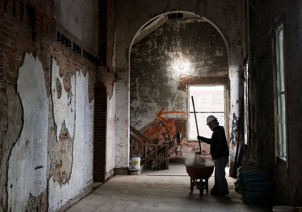 General News - 3rd place - Kevin Olmstead mixes cement inside the Pythian Castle in Toledo. The historic building is undergoing renovations and should be ready for occupation in the spring. Jeremy Wadsworth / The Blade