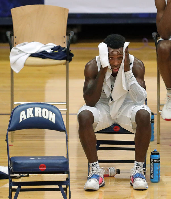 Sports Feature - 3rd place - Akron Zips guard Garvin Clarke reacts as the Zips struggle against Malone during the second half of a game at James A. Rhodes Arena in Akron. Jeff Lange / Akron Beacon Journal