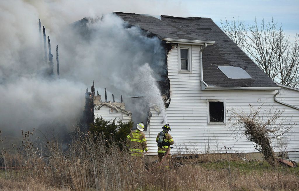 Spot News - 1st place - Southwest Mercer Fire Department responded to a house fire at 1784 St. Joe Rd. in Fort Recovery, OH. The house was deemed at total loss. Daniel Melograna / The Daily Standard