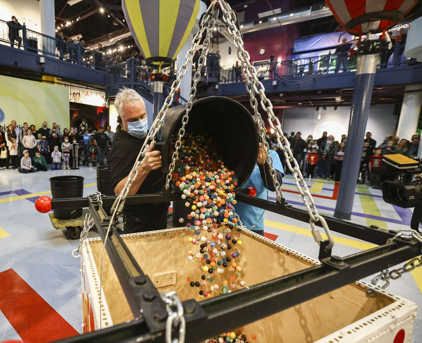 Story - 2nd place - 22,000 bouncy balls are loaded to drop to celebrate New Year's Eve Eve at Imagination Station in Toledo.  (Jeremy Wadsworth / The Blade) 