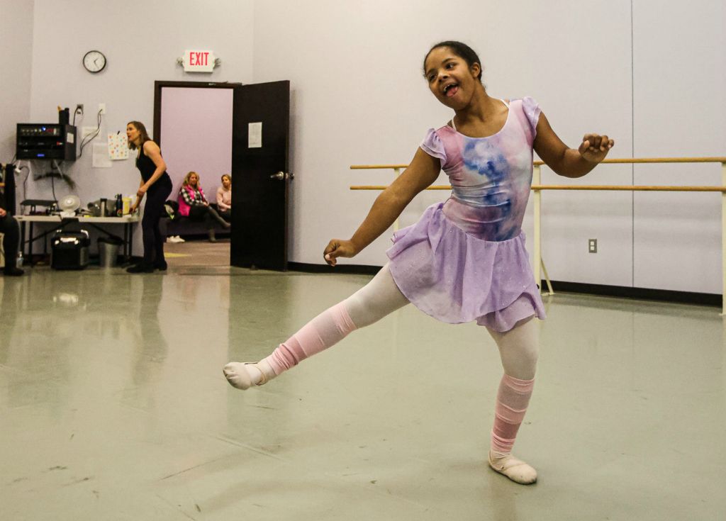 Feature - 2nd place - Student Avin Hatch, 10, laughs as she does a dance across the floor during an adaptive dance class at Toledo Ballet Studios. (Lizzie Heintz / The Blade)