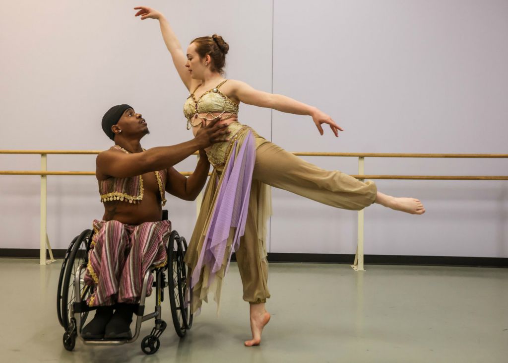 Portrait - 2nd place - Cleveland residents Demarco Sleeper (left) and McKenzie Beaverson, a Toledo Ballet alumna, rehearse their Arabian dance “Coffee” for “The Nutcracker” for the first time in costume for upcoming performance at the Stranahan Theater at Toledo Ballet. (Isaac Ritchey / The Blade)