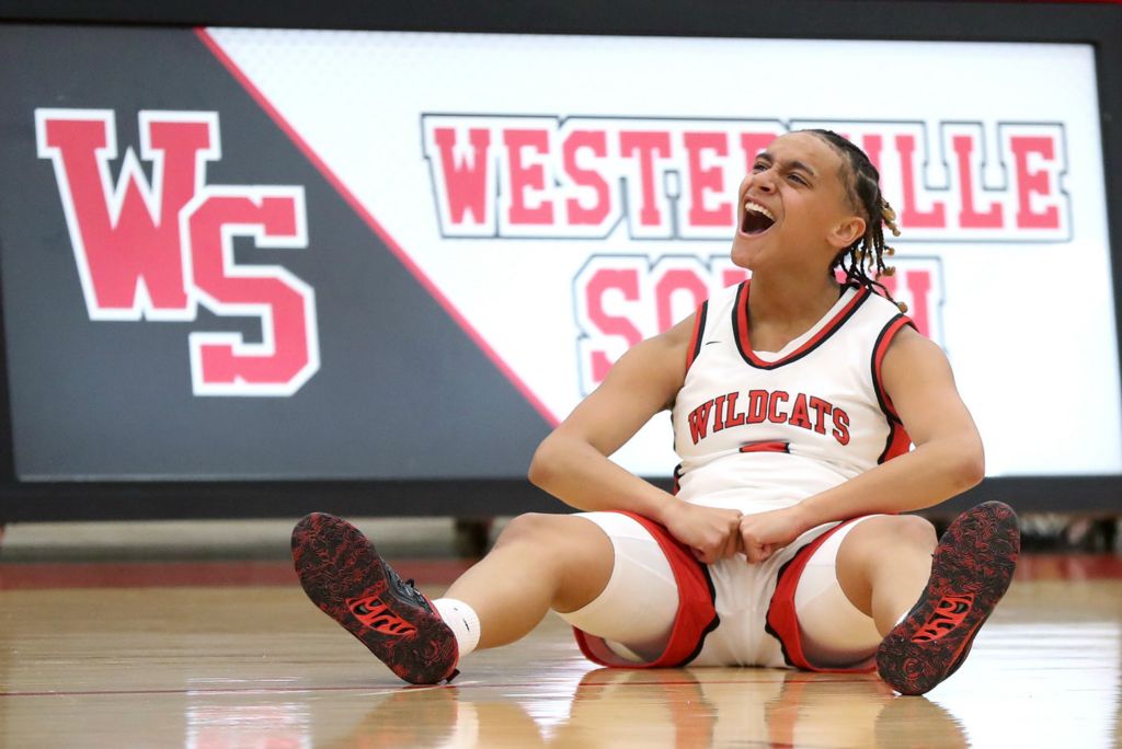 Sports Feature - HM - Westerville South's Arianna Cradle reacts after drawing a foul on a made field goal against Worthington Kilbourne at Westerville South High School. (Shane Flanigan / ThisWeek Community News)