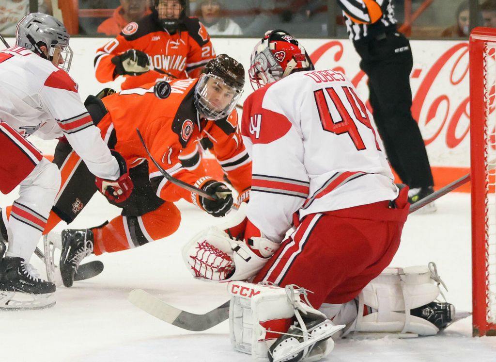 Sports - 3rd place - Bowling Green’s Ethan Scardina tries but fails to score against Ohio State’s Jakub Dobeš at BGSU’s Slater Family Ice Arena in Bowling Green. (Kurt Steiss / The Blade)