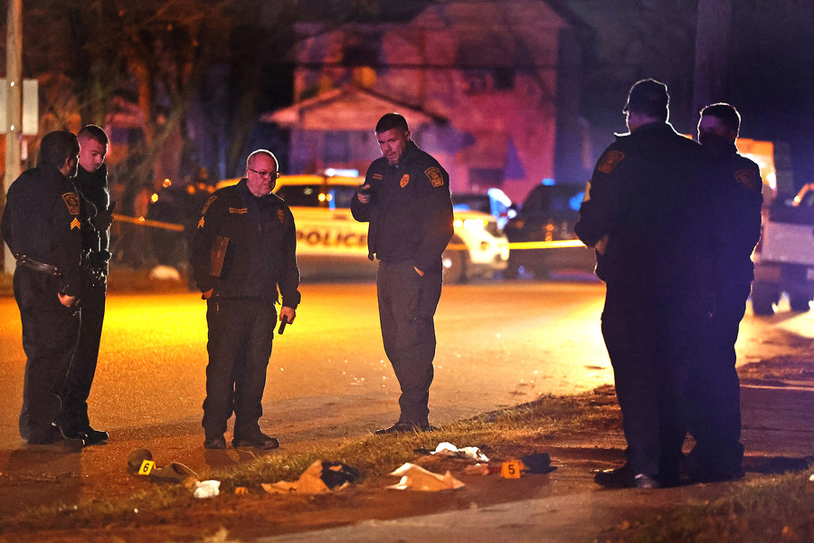 Spot News - 2nd place - The Springfield Police Division investigates the scene of a shooting along the 600 block of Euclid Avenue. According to police they arrived to find a male laying beside the road with a gunshot wound to the head. The victim was transported to Springfield Regional Medical Center and flown by CareFlight to Miami Valley Hospital.  (Bill Lackey / Springfield News-Sun)