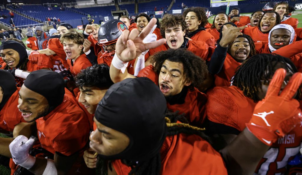 Story - 1st place - Central Catholic players celebrate defeating Columbus Bishop Watterson, 27-7, to win the Division III state championship at Tom Benson Hall of Fame Stadium in Canton.  (Jeremy Wadsworth / The Blade)