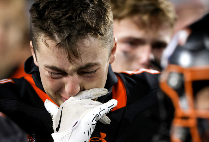 Sports Feature - 1st place - Liberty Center’s Toby Pieracini reacts with his teammates to their loss in the OHSAA Division V state football championship game againstIronton at Tom Benson Hall of Fame Stadium in Canton. (Kurt Steiss / The Blade)