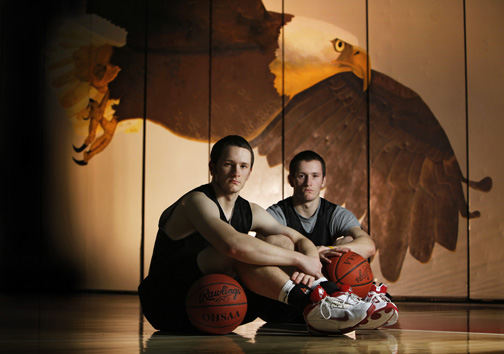 Portrait - 2nd place - Grant Beam ( left) and his brother Tyler after basketball practice at Big Walnut High School.  Grant was expected to be a three sport star by injuries have kept him on the sidelines.   (Chris Russell / The Columbus Dispatch)