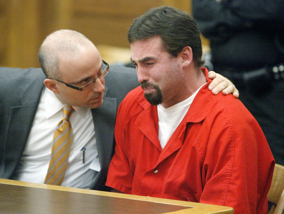 General News - 1st placeAttorney Rick Pitinii (left) comforts his client Michael Marteney after he agreed to a plea deal in  Stark County Common Pleas Court in the death of Antoine Hodge, whom his stabbed 20 times. Marteney claimed self defense and was given 10 years. (Scott Heckel / The (Canton) Repository)