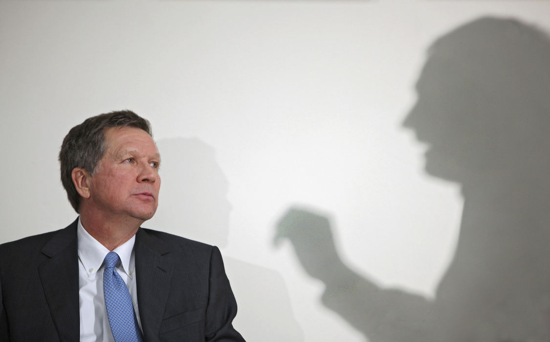 General News - 3rd placeOhio Governor John Kasich listens to business leaders opinions during a "Tax Cut Town Hall" held at Crimson Cup Coffee and Tea in Columbus.  The forum followed the introduction of the governor's new tax plan.  (Chris Russell / The Columbus Dispatch)