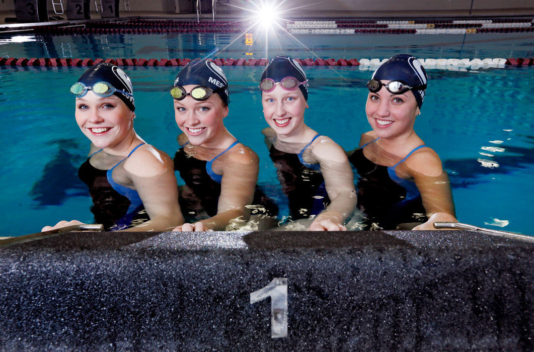 Portrait - 3rd place -  Keely Lovern, Kassandra Mestemaker, Abby Storie, and Sydney King of the Granville 200 yard melody relay team. The team won the state championship last year and are hoping to repeat.  (Eric Albrecht / The Columbus Dispatch)