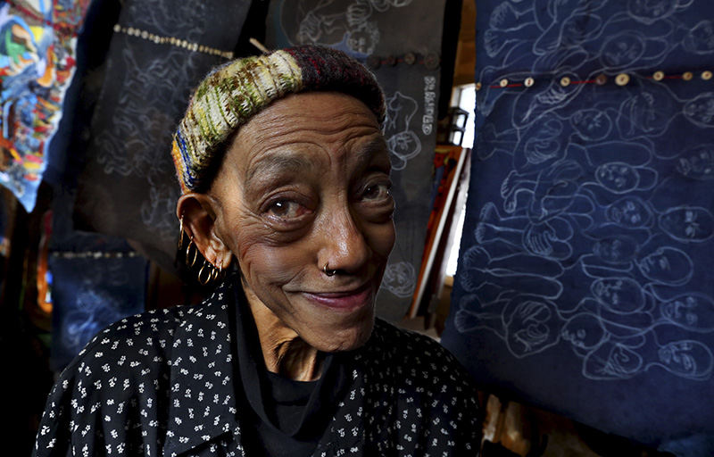 Portrait - 1st place - Artist Aminah Robinson in her studio called the Sanctuary at her house in Columbus. Aminah was celebrating her 75th birthday with a exhibit celebrating her story telling art work. (Eric Albrecht / The Columbus Dispatch)