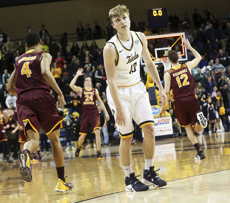 Sports Feature - 1st place - Toledo's Jaelan Sanford (13) reacts as the clock runs out against Central Michigan who defeated the Rockets 76-74. (Katie Rausch / The (Toledo) Blade)