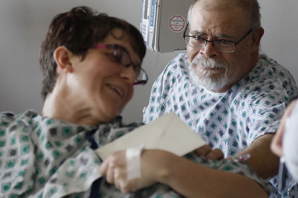 MTStory - 1st place - John holds back tears as he hands Ann a thank-you note after meeting her for the first time a couple of days after their surgeries. "Thank you, dear. So much," he said, teary-eyed, as they embraced later during their meeting. "May God bless you the rest of your life." Later, he said he was feeling better than he had in years and that his new kidney was already doing its job.  (Joshua A. Bickel / The Columbus Dispatch)