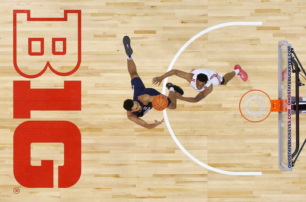 Sports - HMPenn State guard Josh Reaves (23) drives through the lane defended by Ohio State guard C.J. Jackson (3) during the first half of a game at Value City Arena on Feb. 7, 2019.  (Adam Cairns/The Columbus Dispatch)