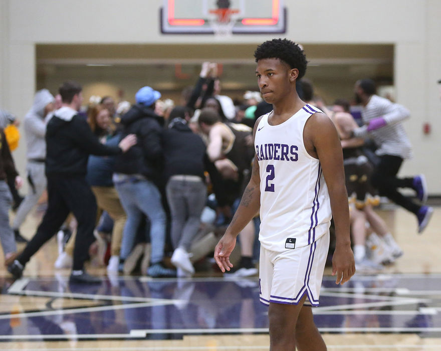 Sports Feature - 3rd placeMount Union's Collen Gurley walks off the court as Baldwin Wallace celebrates their OAC Championship at Mount Union. (Scott Heckel/The Canton Repository)