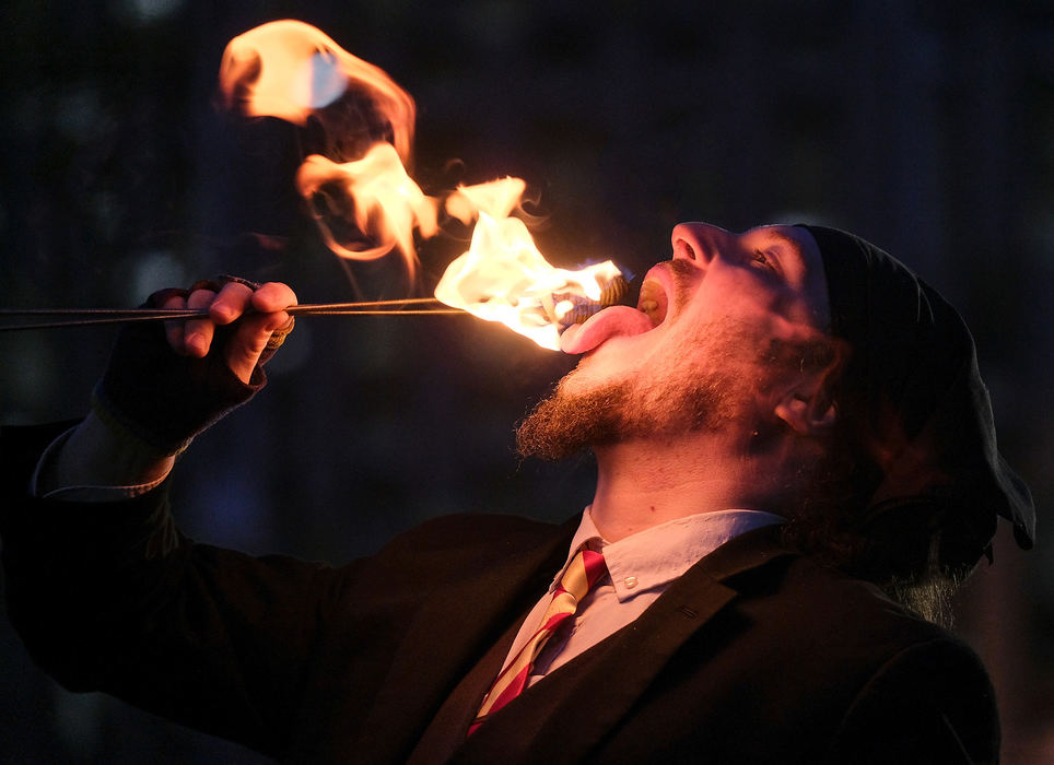 Story - 2nd placeJoshua Wilde of Mr. Wilde's World of Wonder eats fire during the Fire + Ice Festival at Promenade Park in Toledo.  (Jeremy Wadsworth/The Blade)