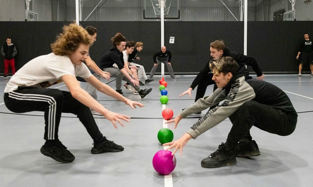 General News - 2nd place - Two Perry High School student teams face off in a dodgeball tournament after ACT and prep testing earlier this morning.  (Aaron Self / The Canton Repository)