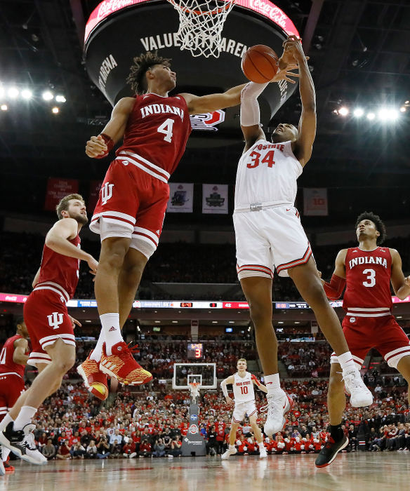 Sports - HM - Ohio State’s Kaleb Wesson (34) and Indiana’s Trayce Jackson-Davis (4) vie for a rebound under the basket during the second half of a game at Value City Arena in Columbus on Feb. 1, 2020. Ohio State won 68-59.     (Adam Cairns / The Columbus Dispatch)