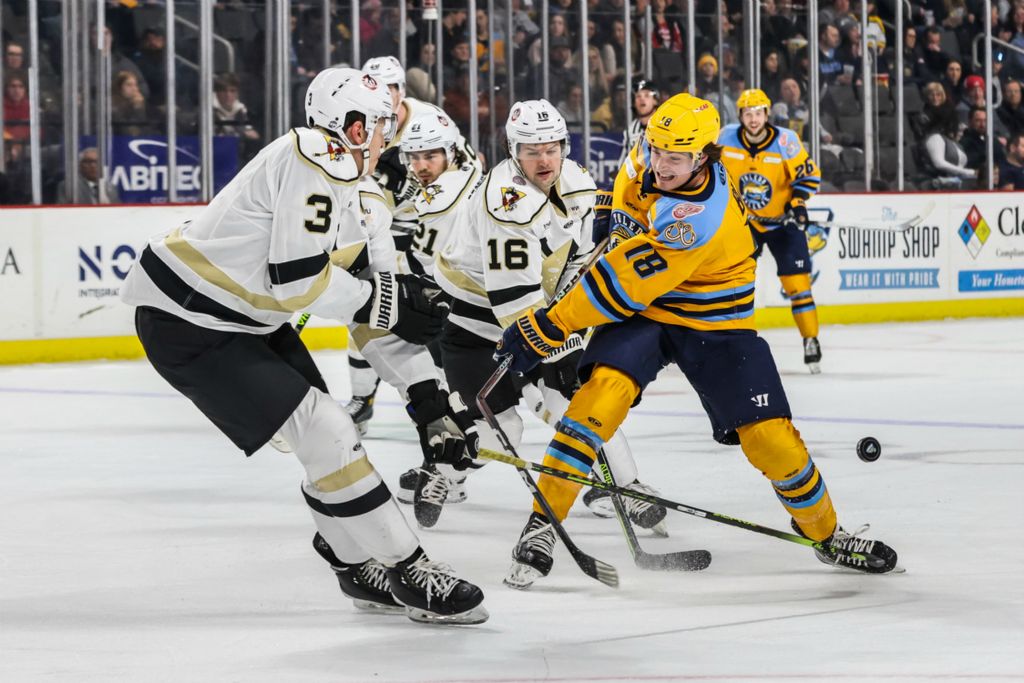 Sports - 2nd place - Toledo Walleye forward Trenton Bliss (18) breaks his stick while trying to make a shot against the Wheeling Nailers in an ECHL hockey game at the Huntington Center in Toledo. (Isaac Ritchey / The Blade)