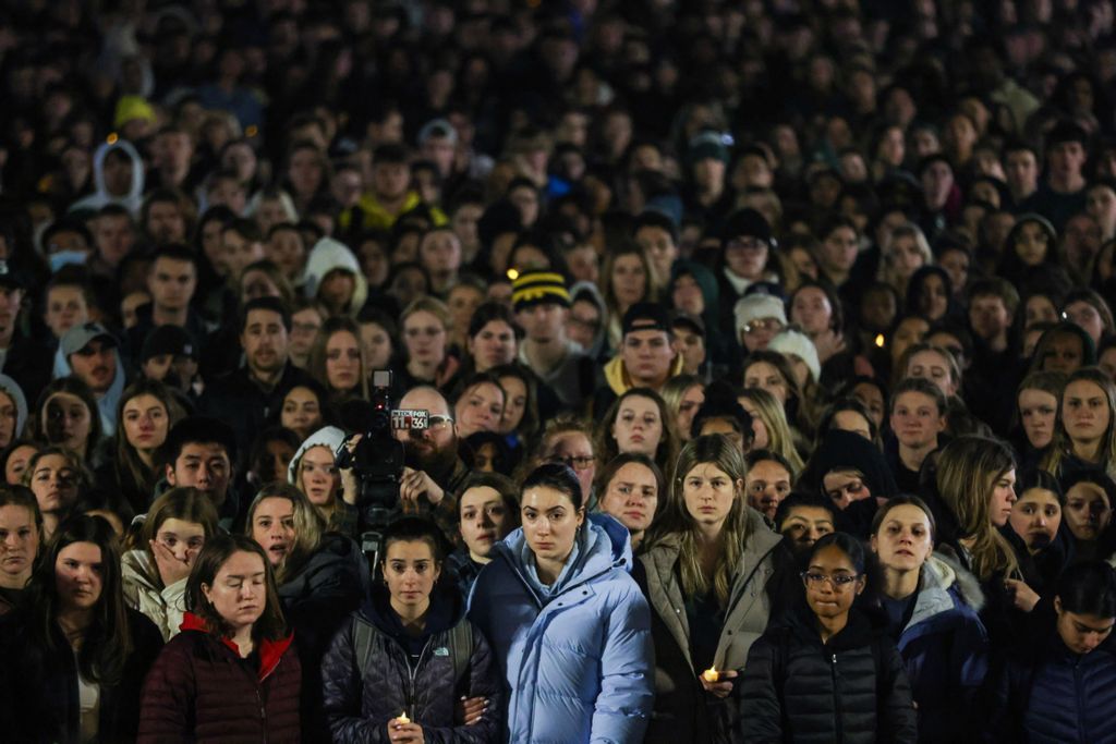 General News - 1st place - Thousands of Michigan students and Ann Arbor residents hold a candle light vigil for the Michigan State University students that were killed shooting, at the Diag at the University of Michigan in Ann Arbor. (Rebecca Benson / The Blade)