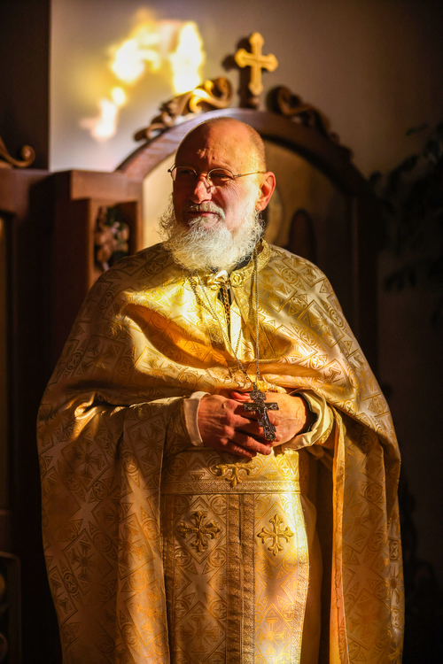 Portrait - 1st place - Father Steven Paliwoda poses for a portrait before Saturday evening liturgy at St Michael's Ukrainian Catholic Church in Rossford. (Rebecca Benson / The Blade)