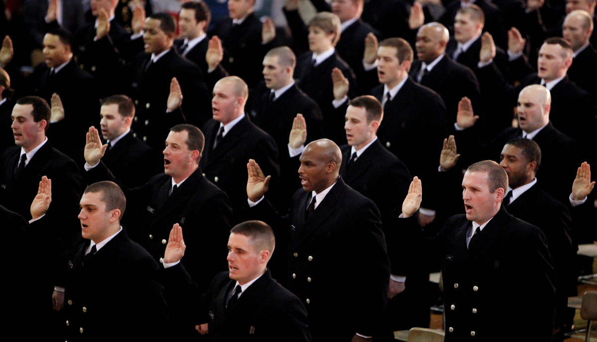 General News - 3rd placeNew Columbus Division of Fire firefighters are sworn during a ceremony held at the division's  training academy. After 32 weeks of training, 61 firefighters graduated. This is the last graduating fire class under Fire Chief Ned Pettus Jr., who will be retiring in March.  (Fred Squillante / The Columbus Dispatch)