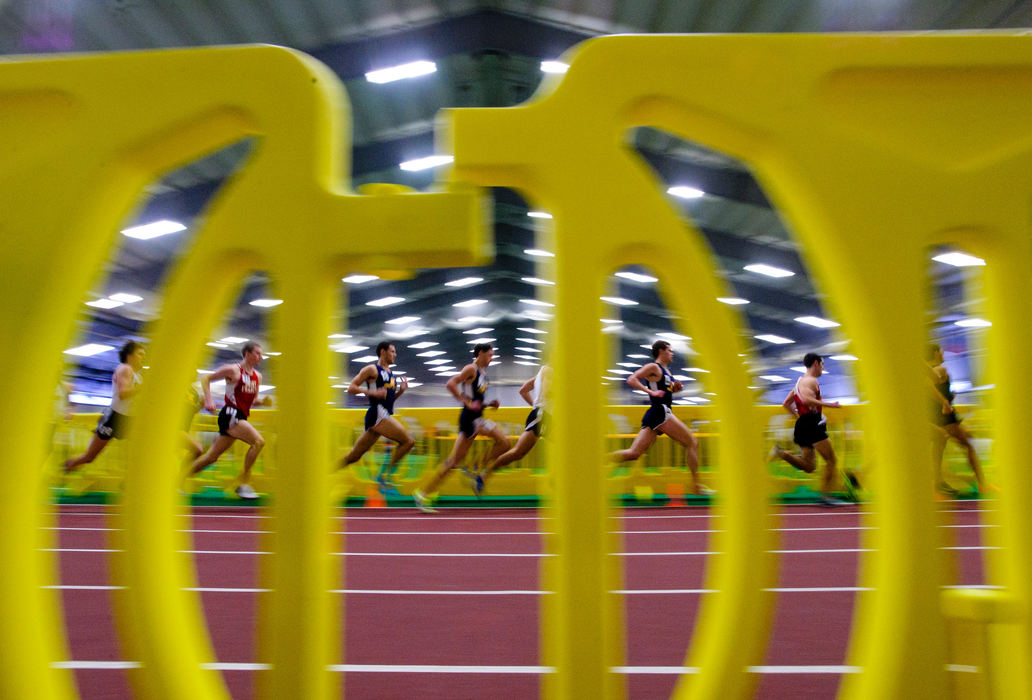 Sports action - 1st placeRunners compete in the one-mile race during the Doug Raymond Invitational in Kent. (Joel Hawksley / Ohio University )