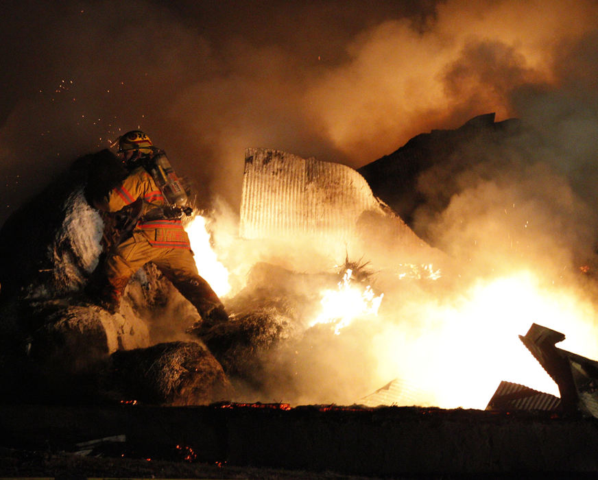 Spot News - 1st placeFire and rescue crews from Cedarville, Harmony, Madison and Stokes Townships battled a three-alarm barn fire at the Waymire farm in Madison Township. Cattle and rabbits were lost in the fire, which took hours to bring control. The structure was declared a total loss. (Barbara J. Perenic / Springfield News-Sun)