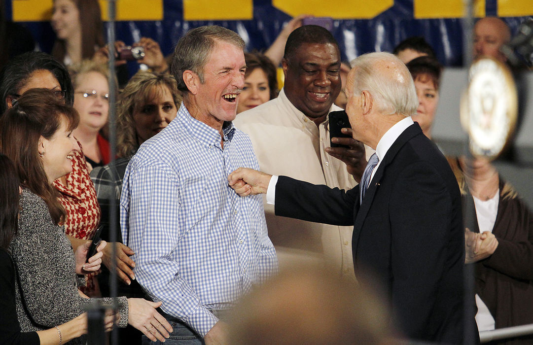 Story - 3rd placeVice President Joe Biden greets the crowd as he enters the room for during a speech about college affordability at Gahanna Lincoln High School. (Adam Cairns / ThisWeek Newspapers)