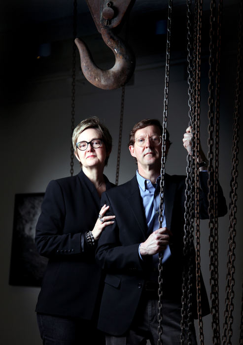 Portrait - 2nd placePeninsula photography collectors Fred and Laura Bidwell are opening the Transformer Station, a $3 million museum in collaboration with the Cleveland Museum of Art. This building that once powered streetcars on the west side will now power the area's growing arts and culture scene. (This hanging hook  and chains are left over from the original transformer station.)  (Lisa DeJong / The Plain Dealer)