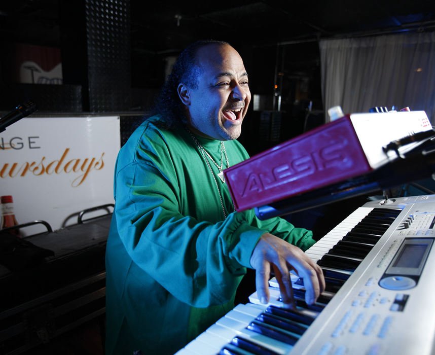 Portrait - 3rd placeDerek Crocket of Khasmir jazz trio poses for portraits during a performance at The Venue Lounge in Columbus. (Thomas Levinson / The Columbus Dispatch)