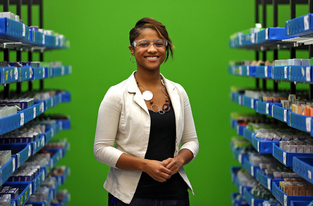 Portrait - HMDzjera Latham poses for a portrait at the VSPOne Columbus Technology Center in Columbus. She was awarded a four-year college scholarship by VSP Vision Care valued at nearly $70,000.  (Jonathan Quilter / The Columbus Dispatch)