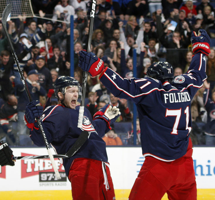 Sports Feature - 1st placeColumbus Blue Jackets center Mark Letestu (10) celebrates his goal with Columbus Blue Jackets left wing Nick Foligno (71) against Chicago Blackhawks in the first period of their NHL game at Nationwide Arena.  (Kyle Robertson / The Columbus Dispatch)