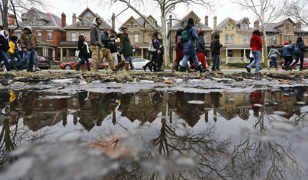 General News - 3rd place - A group of about 50 Ohio State students march nearly three miles from campus to Columbus City Hall as part of the Martin Luther King, Jr. Day celebration. Many in the group sang songs and yelled chants harkening back to the civil rights movement of the 1960s.  (Adam Cairns / The Columbus Dispatch)