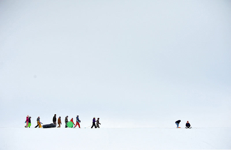 Feature - 3rd place - Sledders enjoy a snow day at Outhwait Reservoir, Bucyrus, Ohio.   (Mitchell Pe Masilun / The (Mansfield) News Journal)