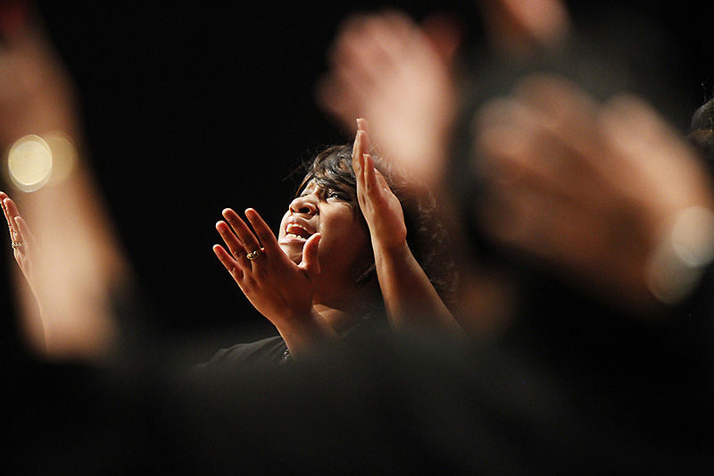 General News - 1st place - Kimberly Marshall and the rest of the Mt. Olivet Baptist Church Gospel Choir perform during the Dublin Martin Luther King, Jr. Remembrance Celebration at Dublin Coffman High School.  The theme of this years event was "If I Can Help Somebody". (Lorrie Cecil / ThisWeek Newspapers)